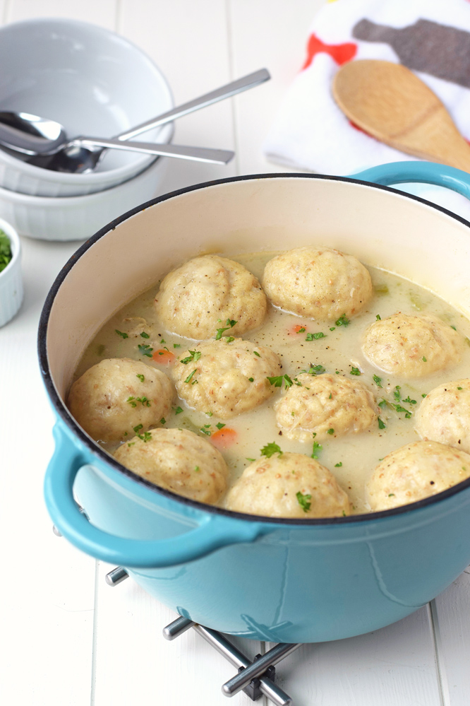 This Creamy Chicken and Dumplings recipe makes the perfect comfort food so easy! The soup is creamy, flavorful, and full of chicken and vegetables. And, it doesn't get simpler than using Rhodes frozen dough for the perfect fluffy dumplings!