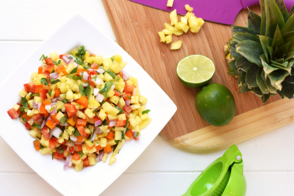 This Fresh Pineapple Salsa is the perfect summer side dish or party appetizer! Only 6 fresh ingredients and 15 minutes to make and the flavor is amazing.
