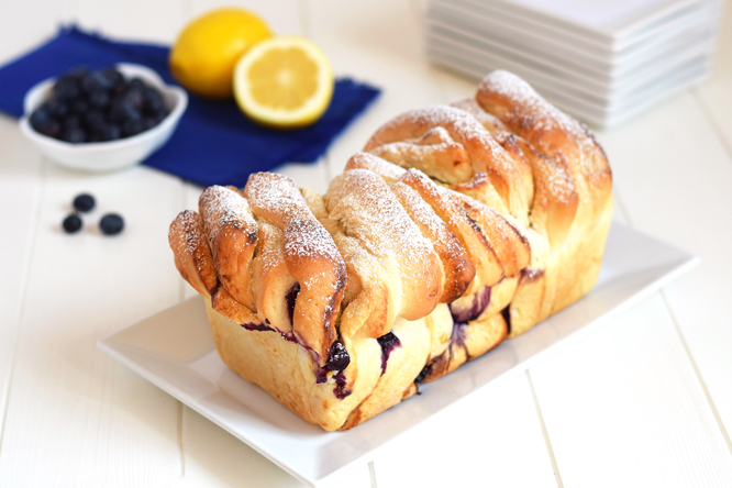 Blueberry Cream Cheese Pull Apart Bread - This gorgeous bread with a blueberry lemon cream cheese filling is so simple to make with frozen dough! Perfect for breakfast of brunch.